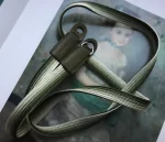 Bamboo Safari is a handmade camera neck strap made with Japanese kumihimo silk and genuine leather. Comfortable, durable, and ideal for premium cameras.
