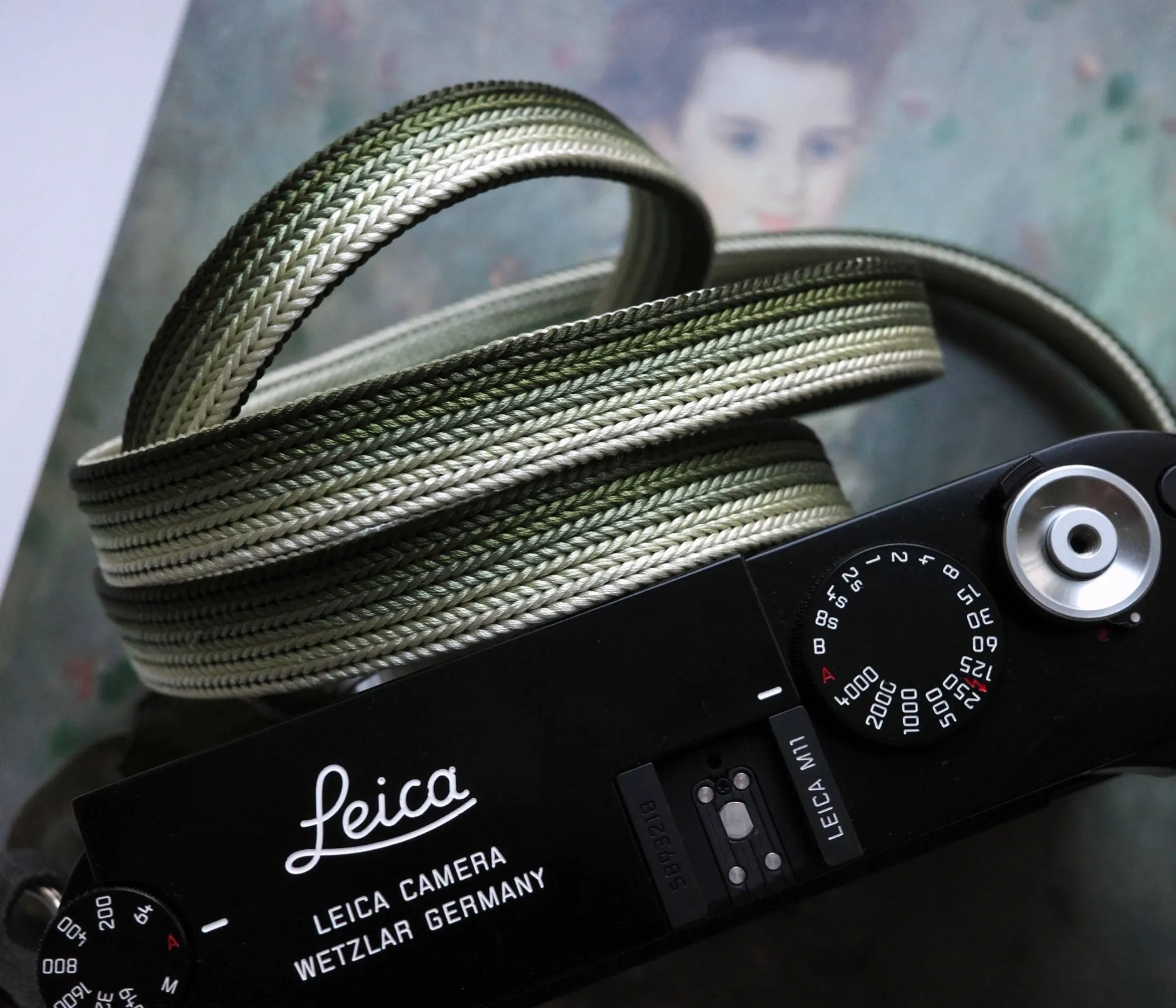 Bamboo Safari is a handmade camera neck strap made with Japanese kumihimo silk and genuine leather. Comfortable, durable, and ideal for premium cameras.