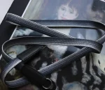 We have adopted the braiding technique known as Bamboo-gumi, which dates back to the Kamakura period and was primarily used for horse bridles (omogai). Its characteristic is that a variety of patterns can be created through different combinations of the braided cords. It's a flat, soft camera strap. The ring conection part is sewing with the leather，it is best to match the color you prefer with the leather you are making the Kumihimo with.