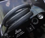 We have adopted the braiding technique known as Bamboo-gumi, which dates back to the Kamakura period and was primarily used for horse bridles (omogai). Its characteristic is that a variety of patterns can be created through different combinations of the braided cords. It's a flat, soft camera strap. The ring conection part is sewing with the leather，it is best to match the color you prefer with the leather you are making the Kumihimo with.